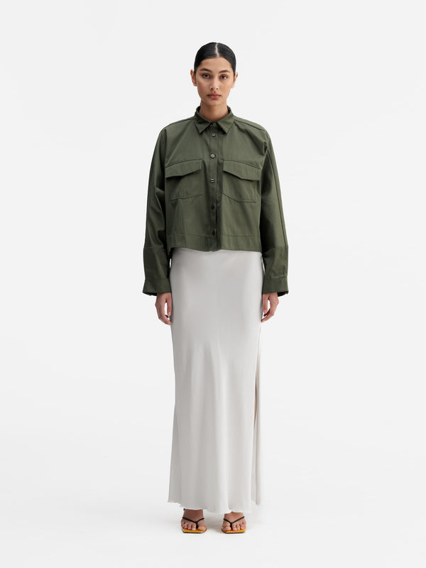 Model wearing Ahlvar Gallery Kori over shirt olive green