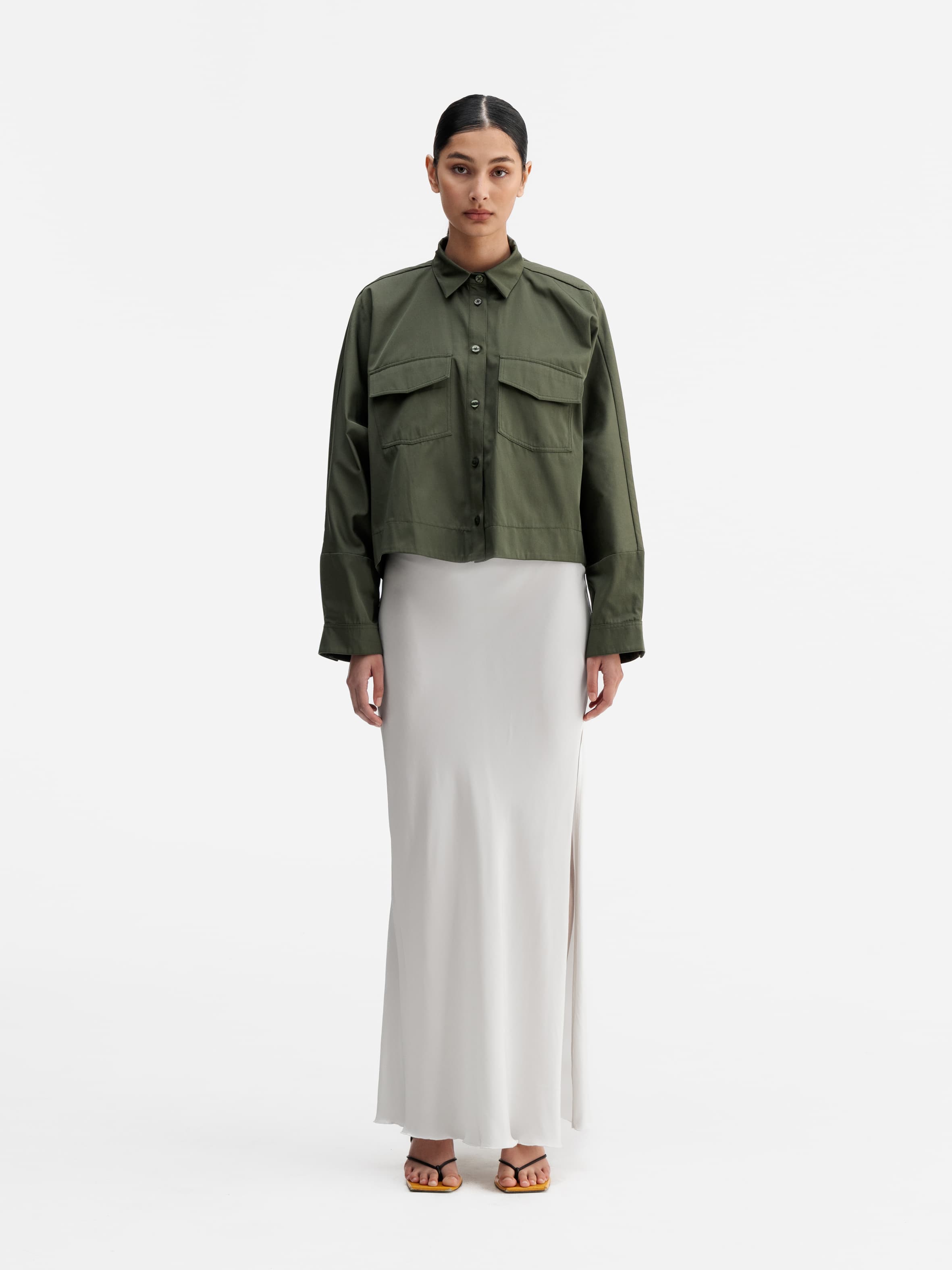 Model wearing Ahlvar Gallery Kori over shirt olive green