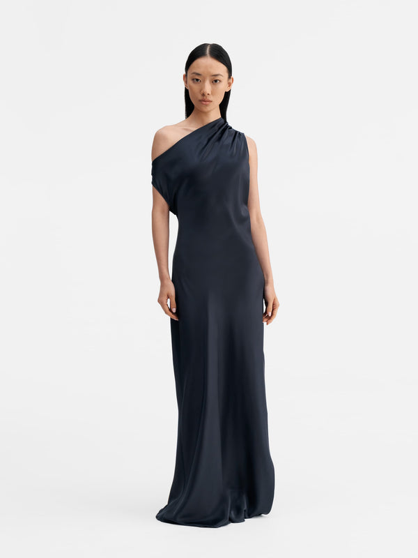Model wearing Ahlvar Gallery Lacy satin dress blue grey