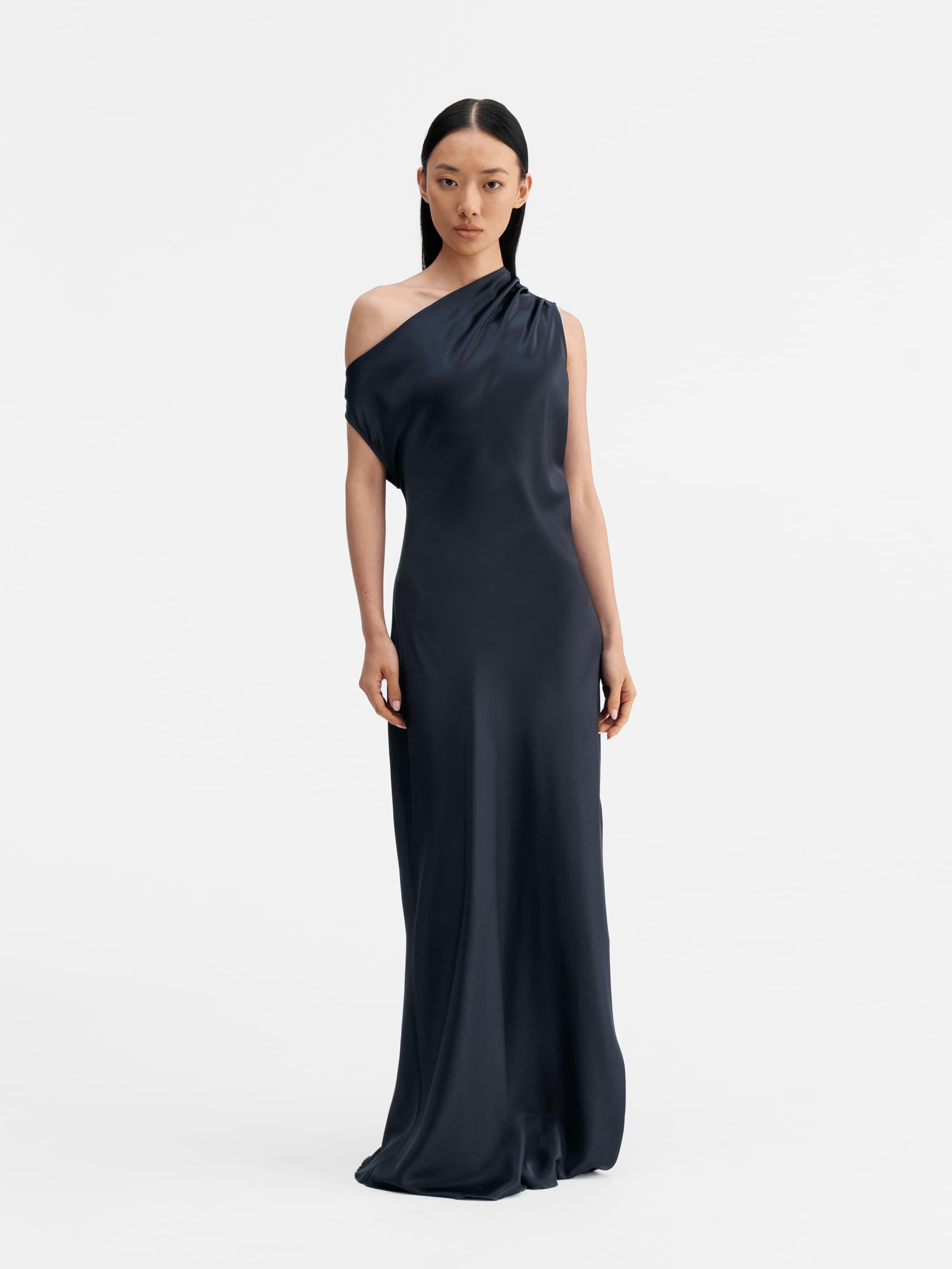 Model wearing Ahlvar Gallery Lacy satin dress blue grey