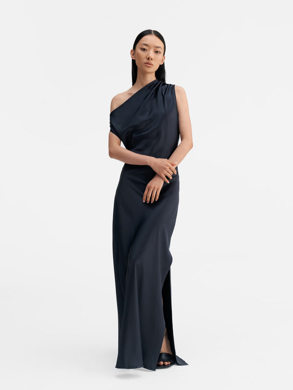 Model wearing Ahlvar Gallery Lacy satin dress blue grey