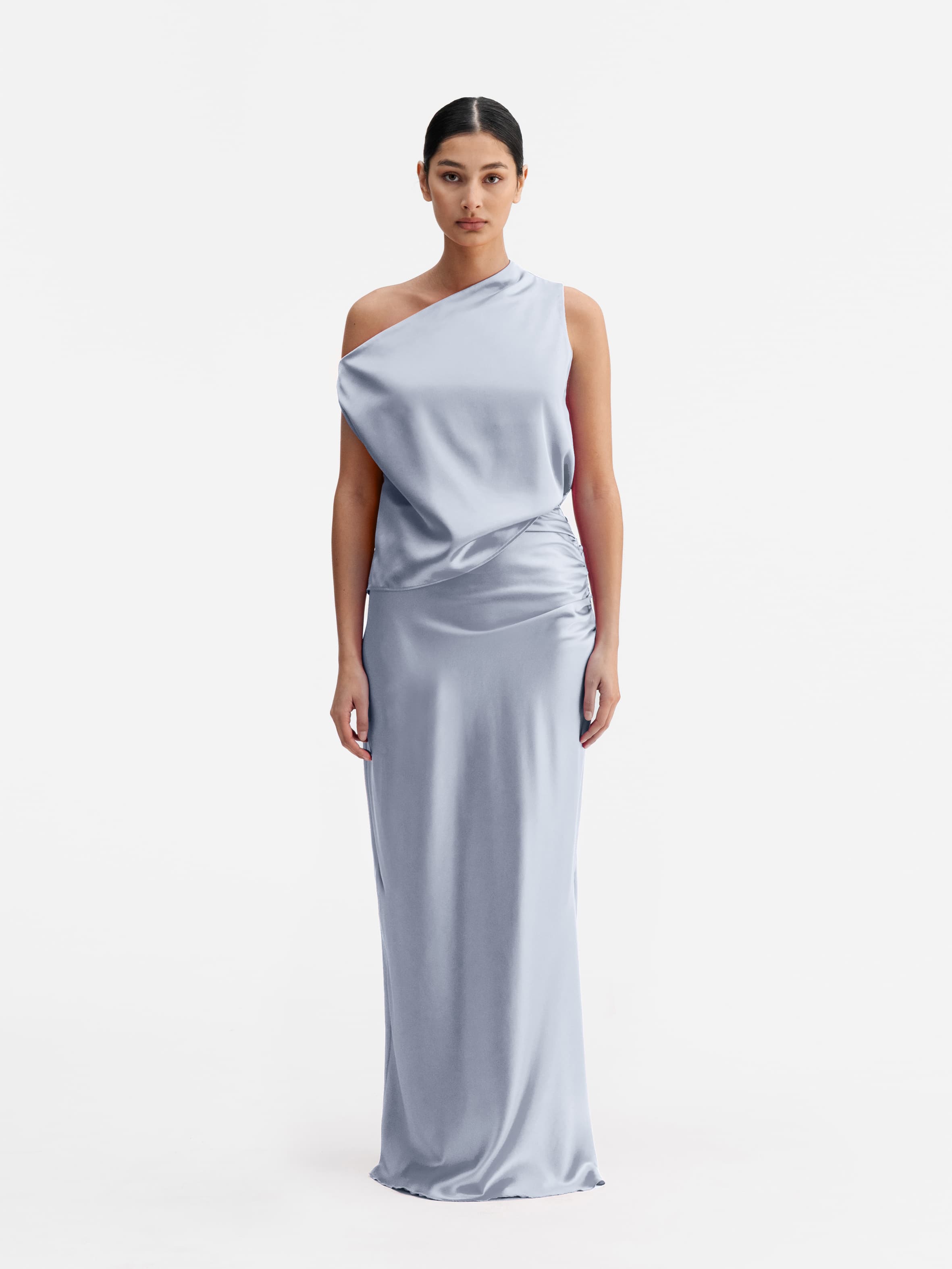 Model wearing Ahlvar Gallery Lacy satin tank denim blue