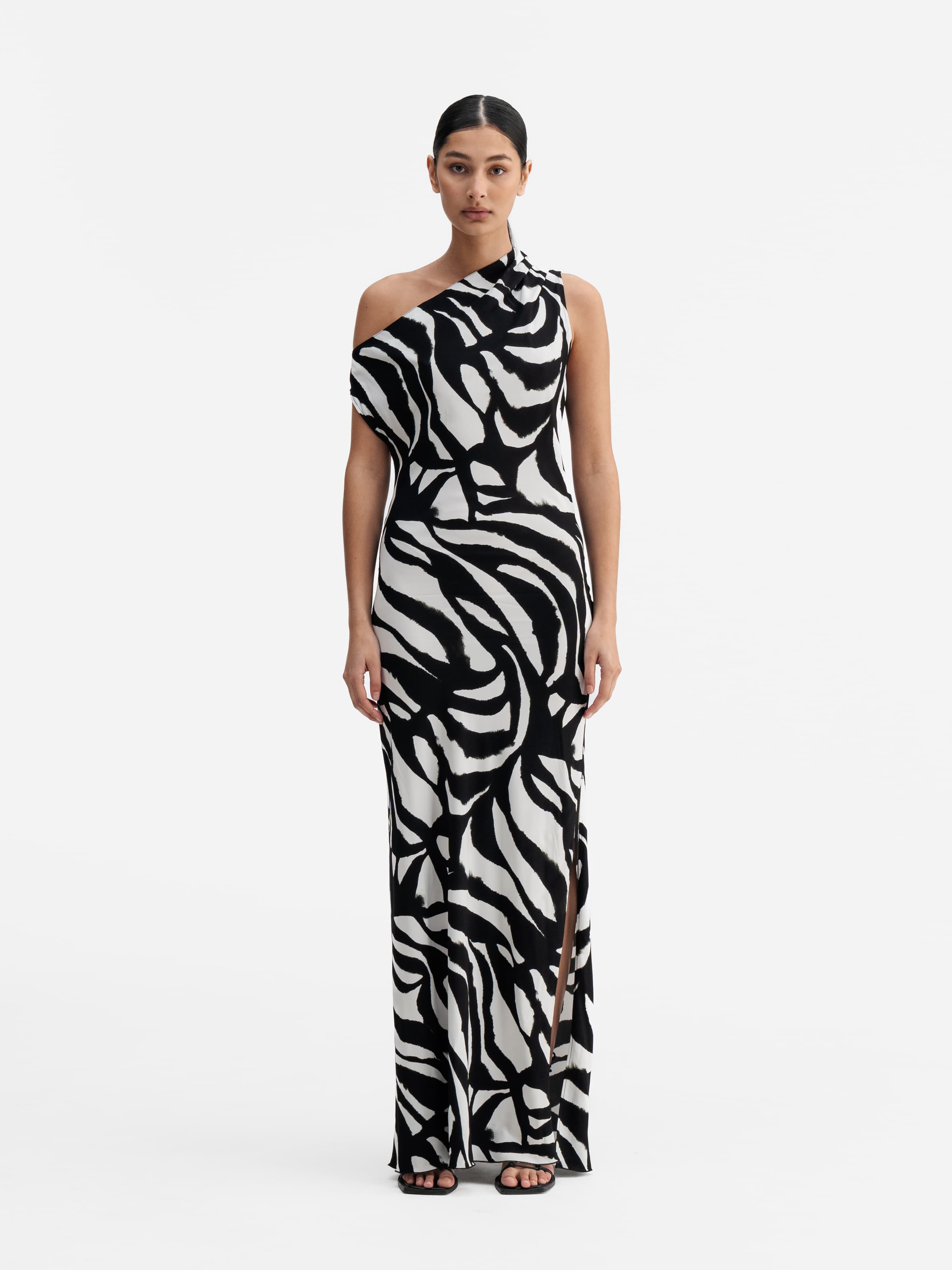 Model wearing Ahlvar Gallery Lacy zebra dress white