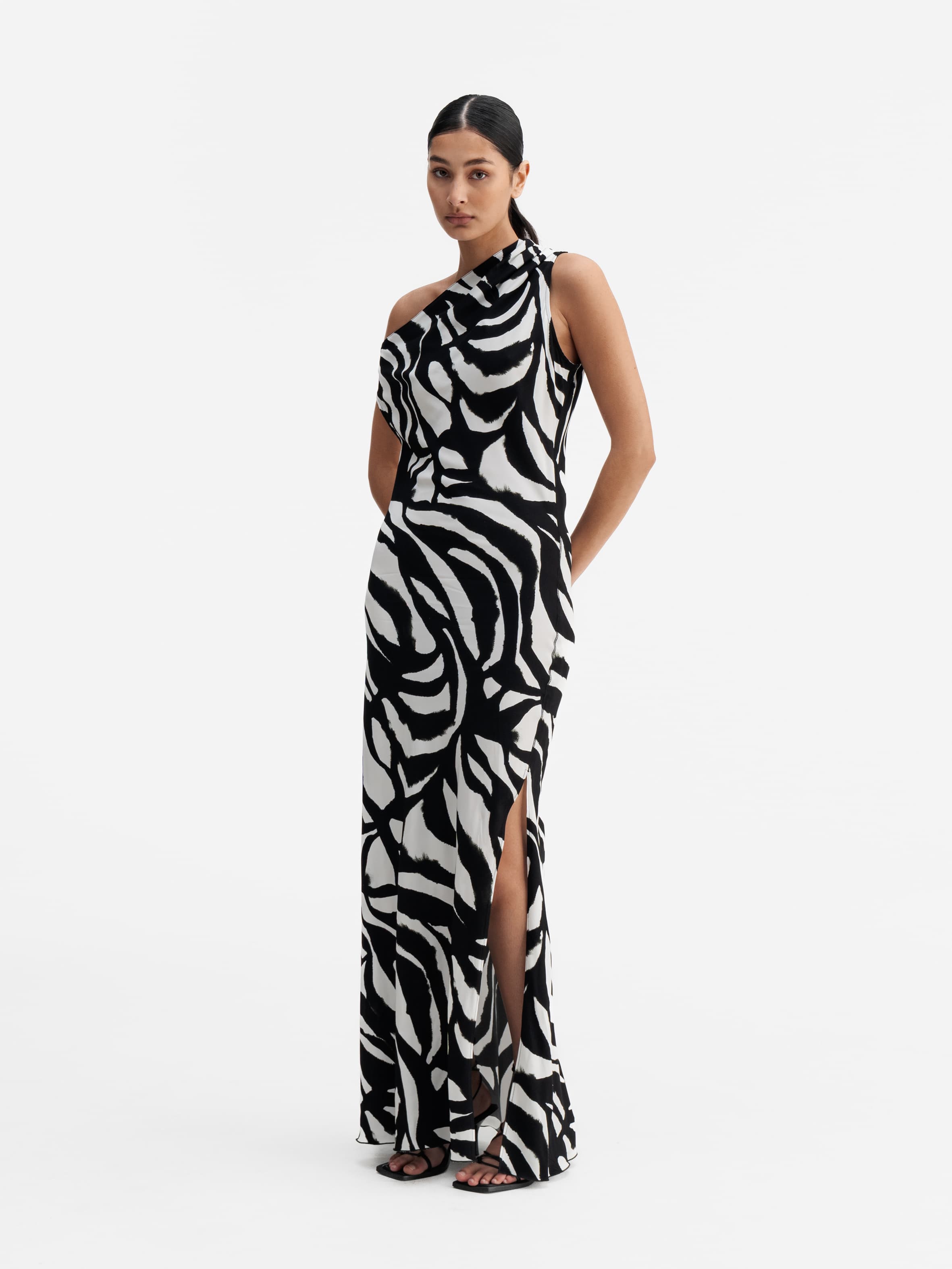 Model wearing Ahlvar Gallery Lacy zebra dress white