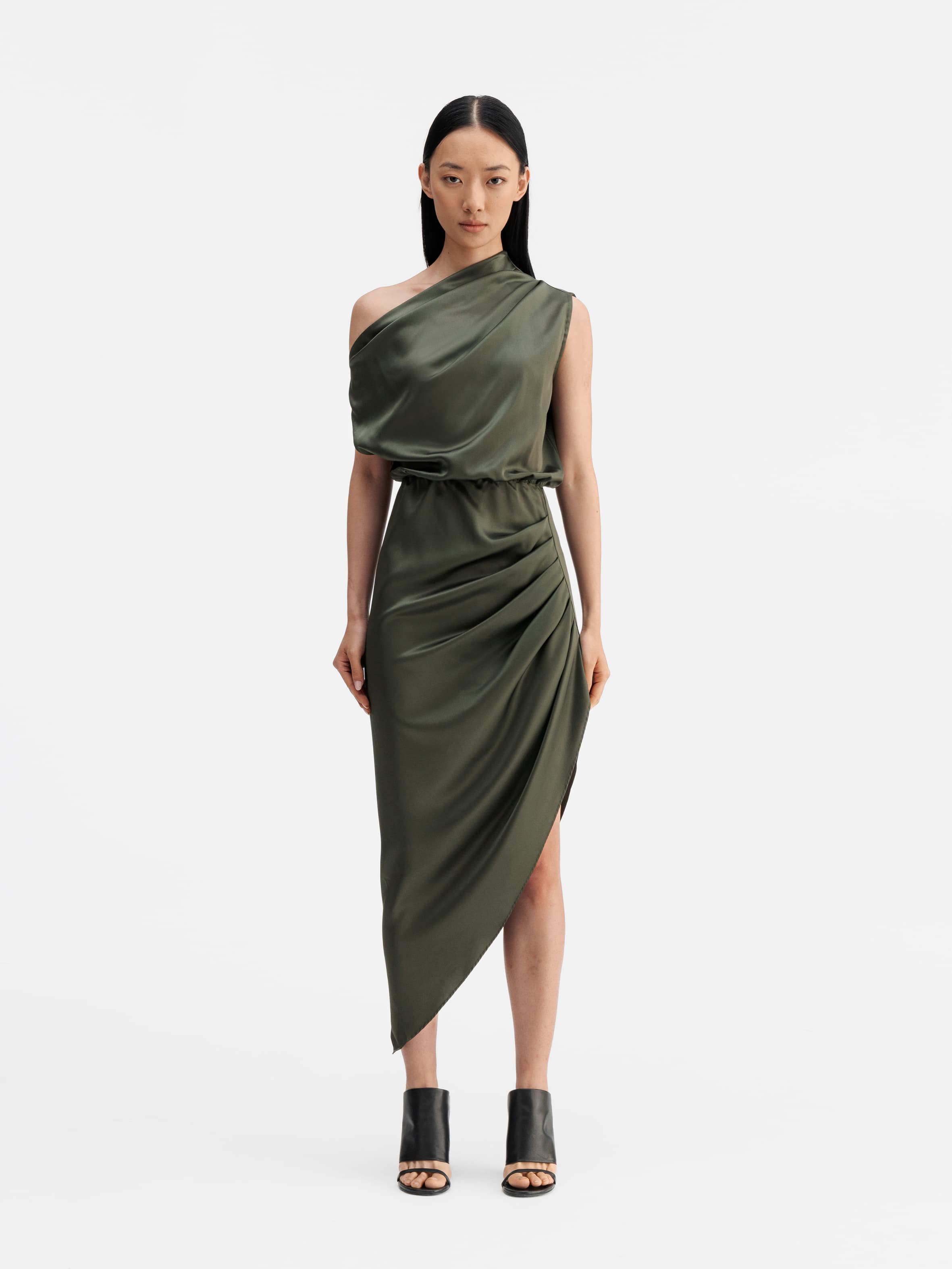 Model wearing Ahlvar Gallery Lana satin dress olive green