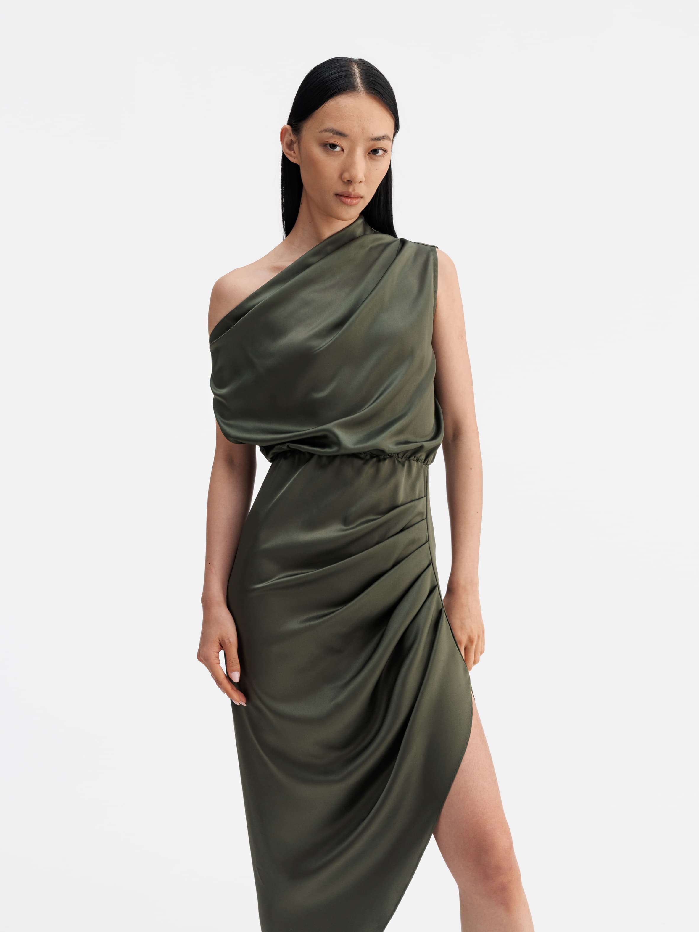 Model wearing Ahlvar Gallery Lana satin dress olive green