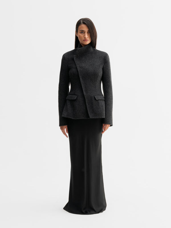 Model wearing Ahlvar Gallery Leia wool blazer in Black