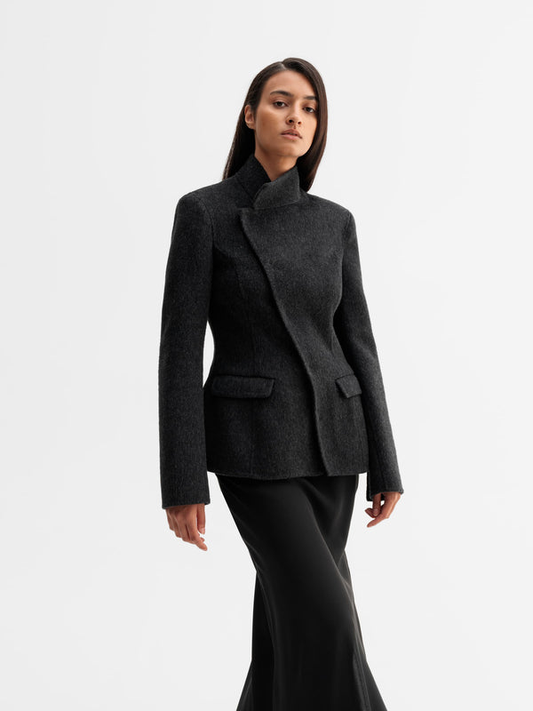 Model wearing Ahlvar Gallery Leia wool blazer in Black