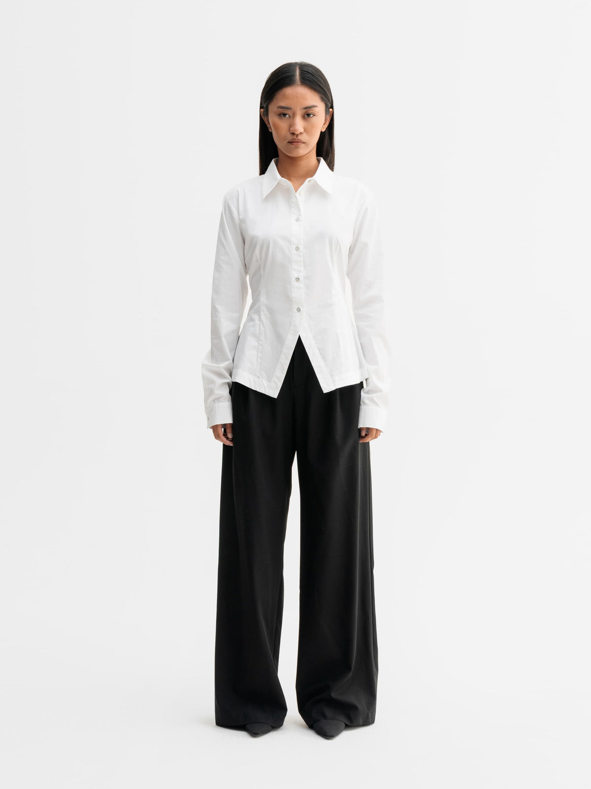 Model wearing Ahlvar Gallery Leia shirt in White