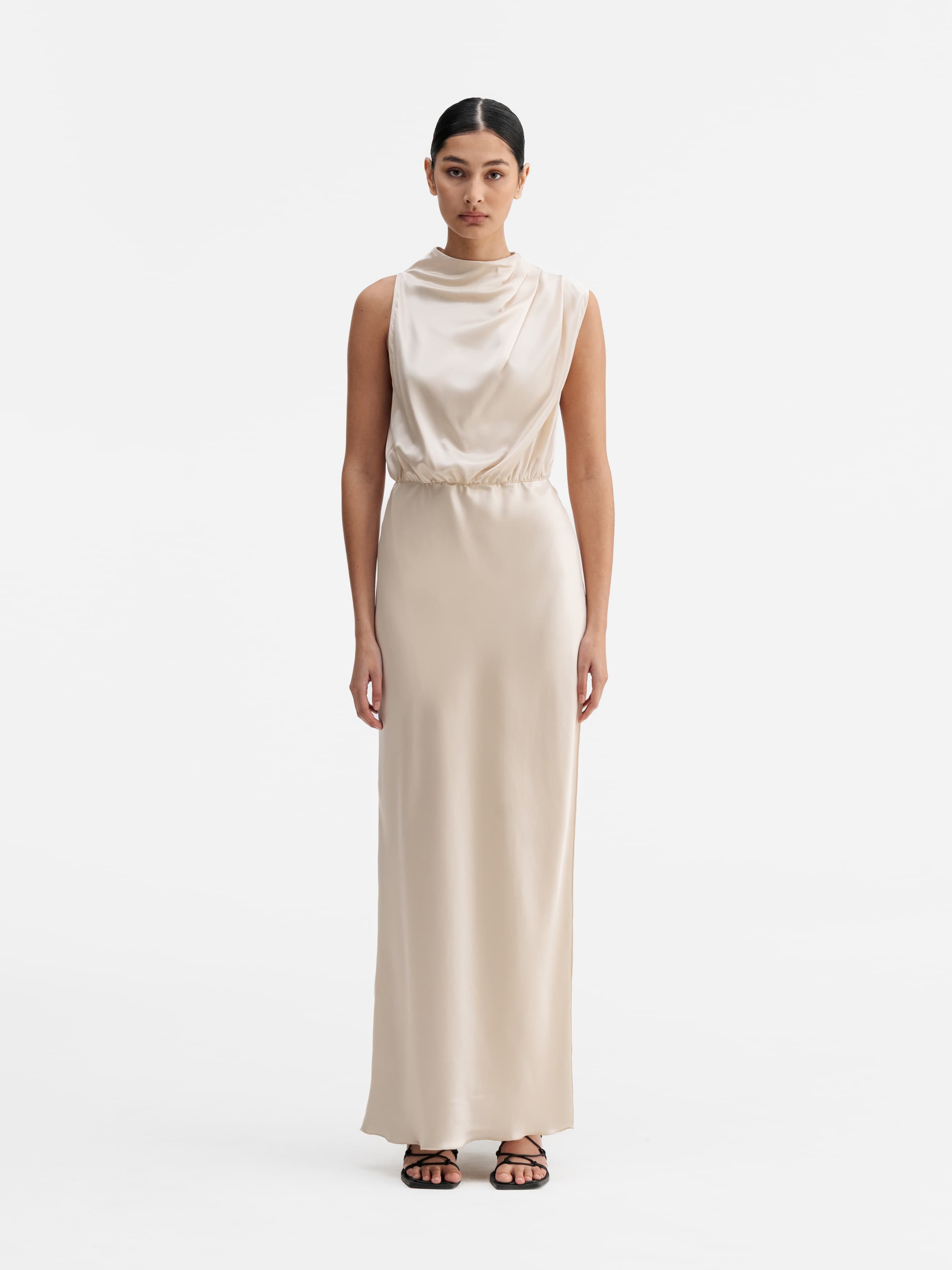 Model wearing Ahlvar Gallery Lima satin dress cream