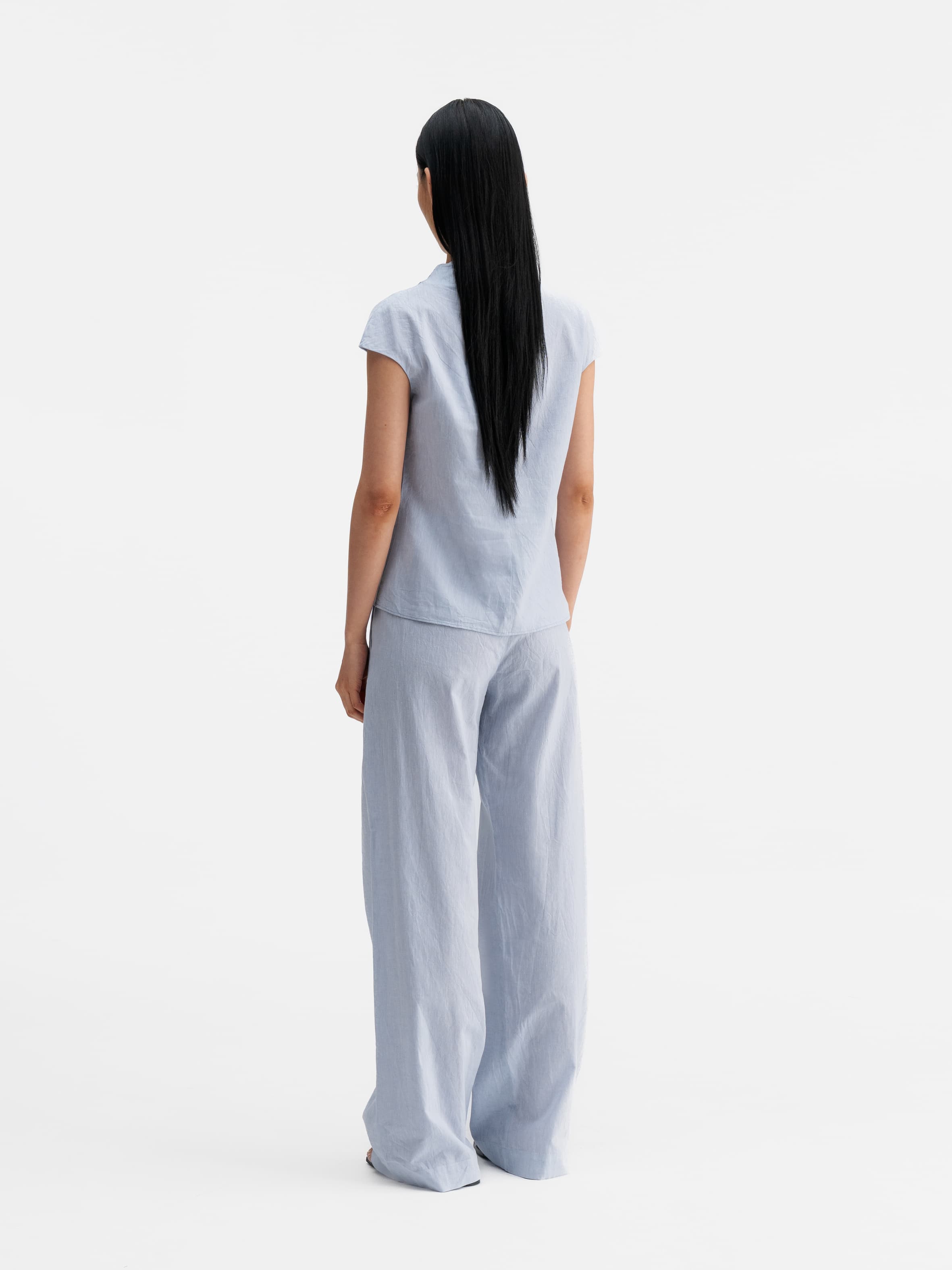 Back view of Ahlvar Gallery Lima linen top denim blue