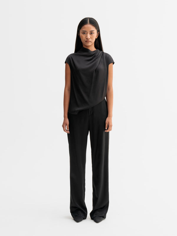Model wearing Ahlvar Gallery Lima silk top in Black