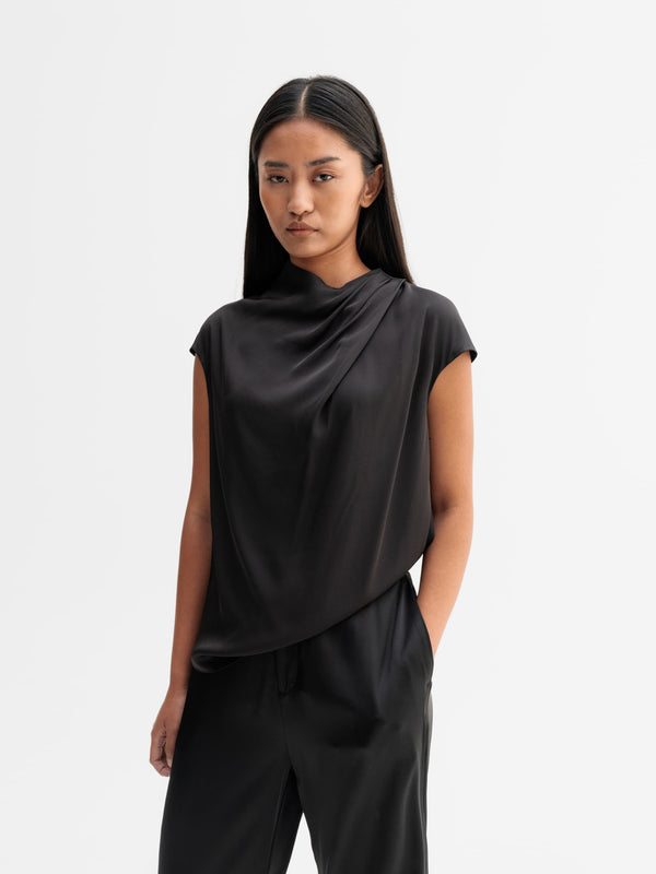 Model wearing Ahlvar Gallery Lima silk top in Black