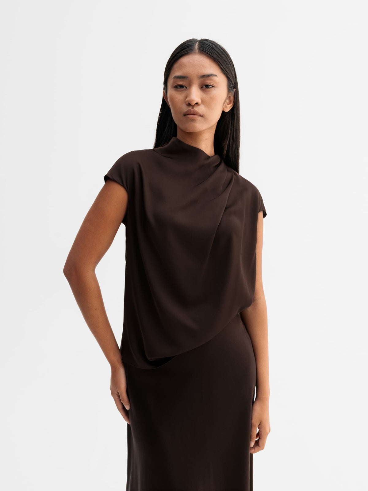 Model wearing Ahlvar Gallery Lima silk top in Dark brown