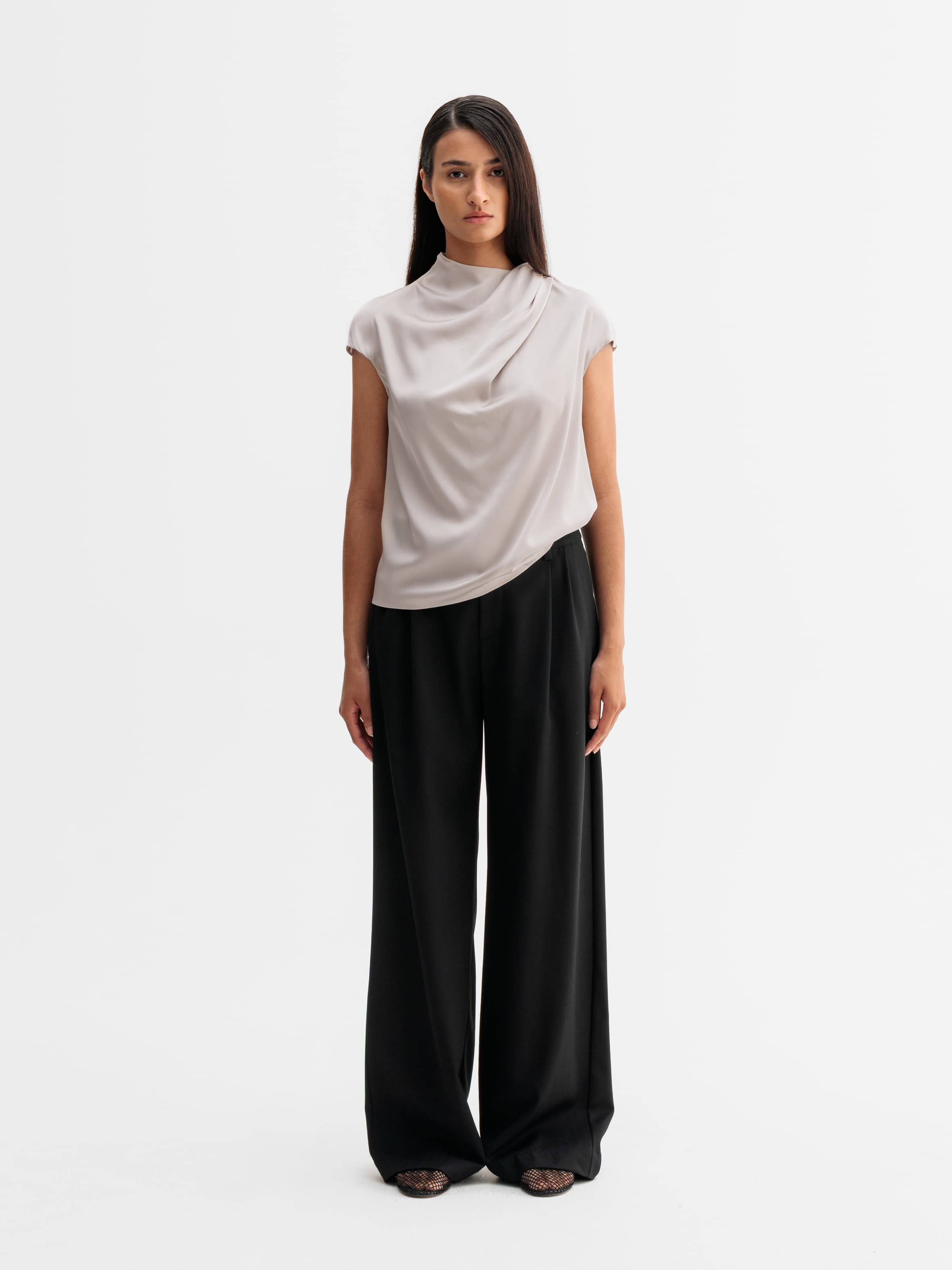 Model wearing Ahlvar Gallery Lima silk top in Greige