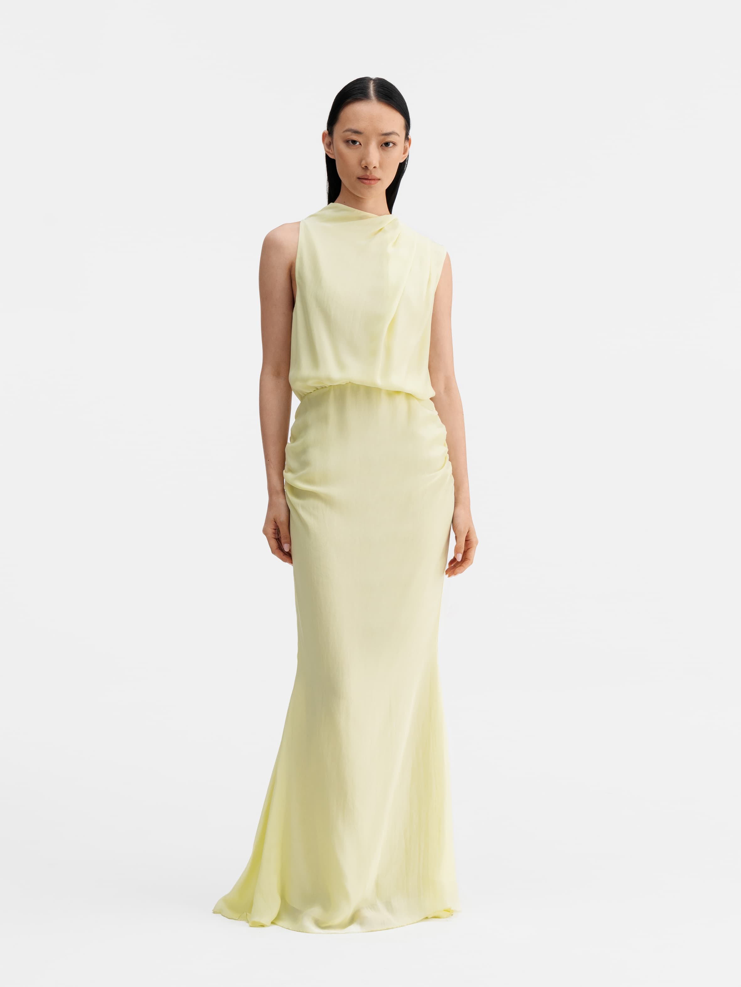 Model wearing Ahlvar Gallery Lima summer dress lime