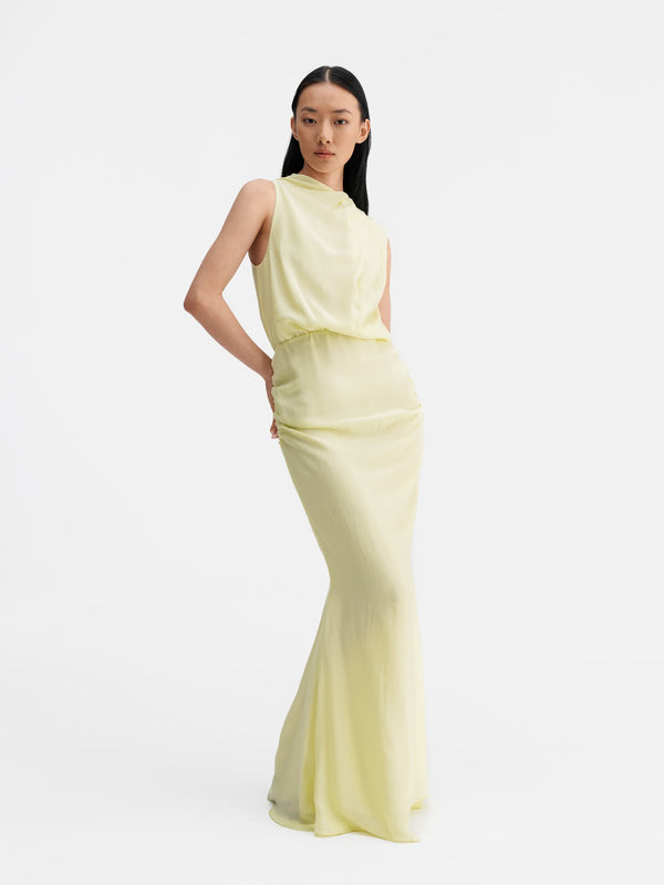 Model wearing Ahlvar Gallery Lima summer dress lime