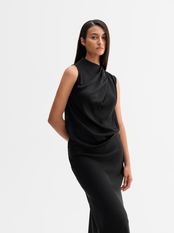 Model wearing Ahlvar Gallery Lima silk tank in Black