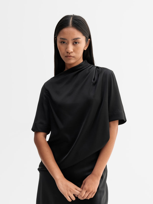Model wearing Ahlvar Gallery Lima silk tee in Black