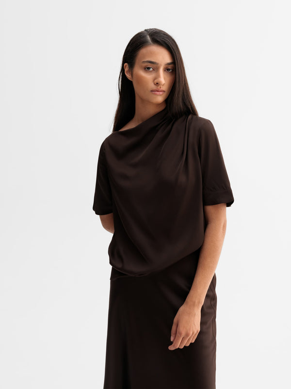 Model wearing Ahlvar Gallery Lima silk tee in Dark brown