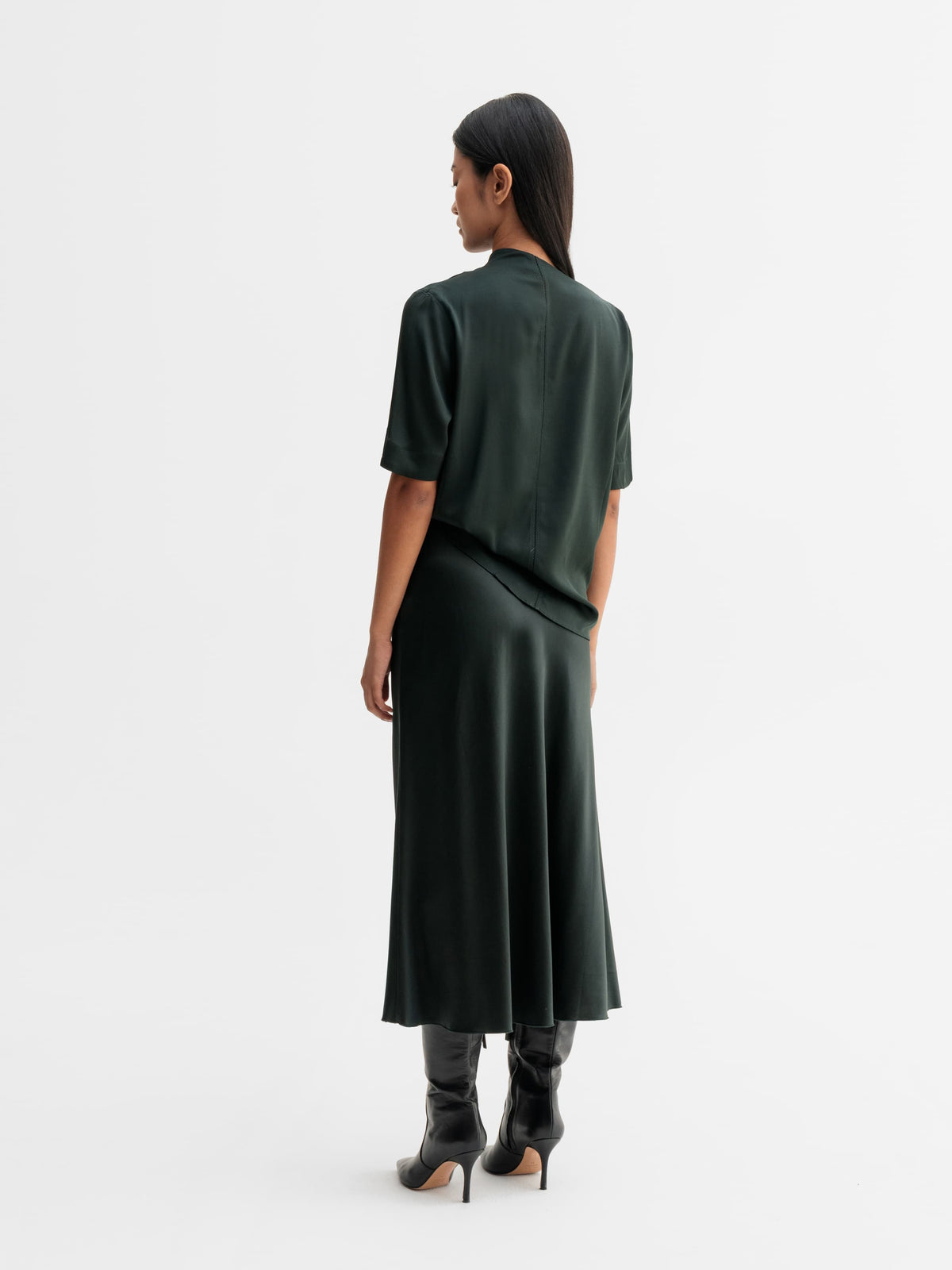 Back view of Ahlvar Gallery Lima silk tee in Deep forest