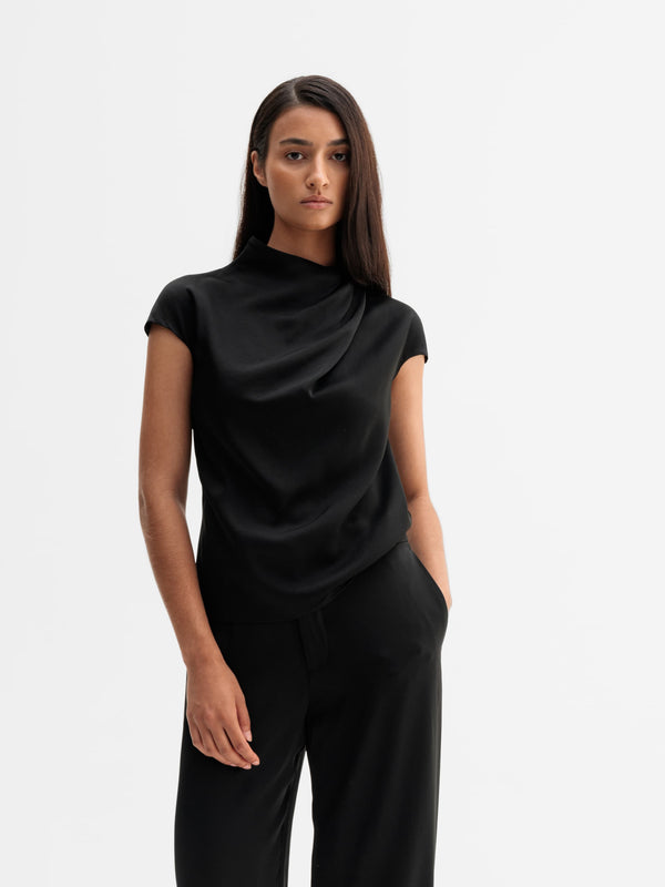 Model wearing Ahlvar Gallery Lima top in Black