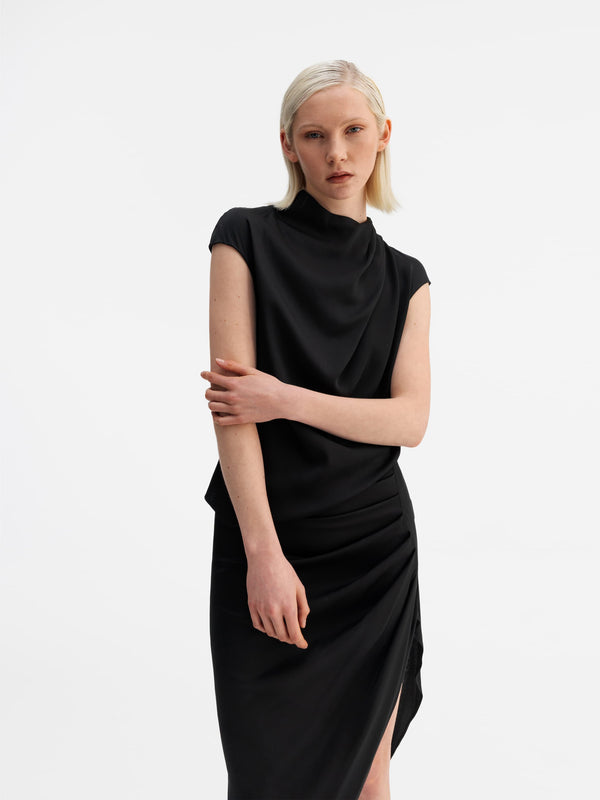 Model wearing Ahlvar Gallery Lima silk top black