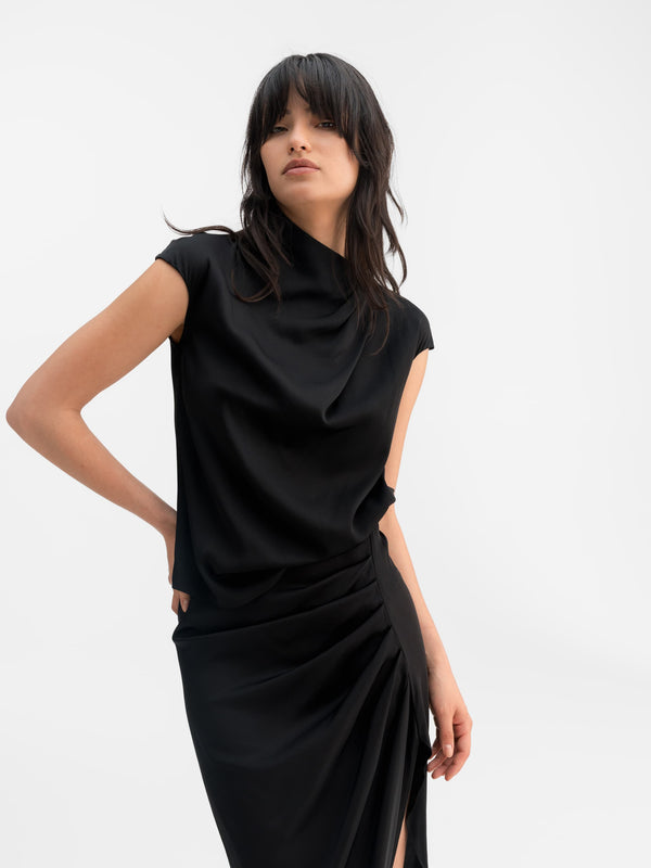 Model wearing Ahlvar Gallery Lima silk top black