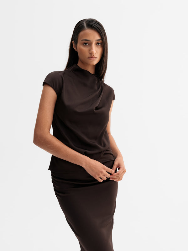Model wearing Ahlvar Gallery Lima top in Dark brown