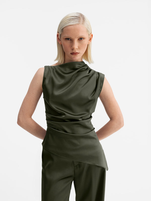 Model wearing Ahlvar Gallery Lizi satin tank olive green