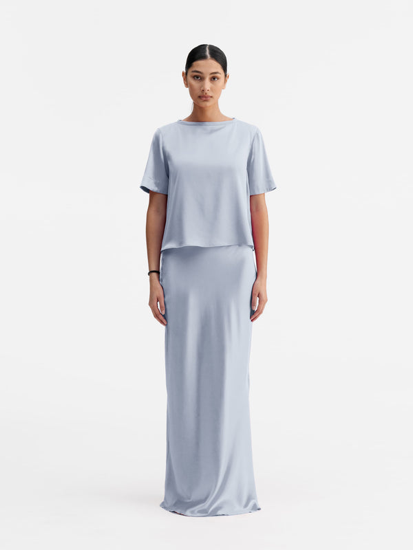 Model wearing Ahlvar Gallery Lola satin tee denim blue