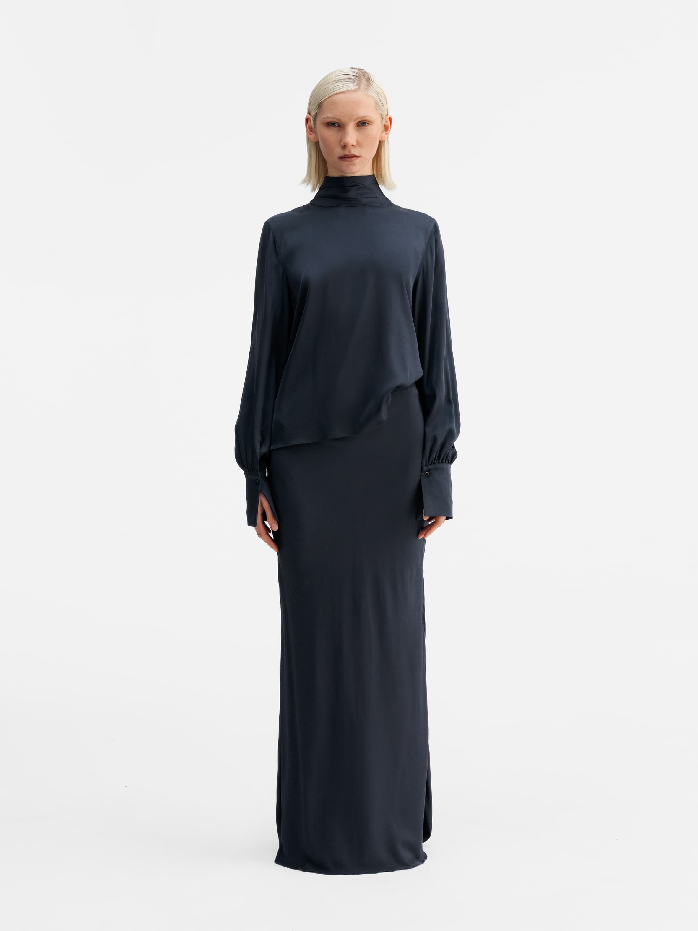 Model wearing Ahlvar Gallery Luna silk blouse blue grey
