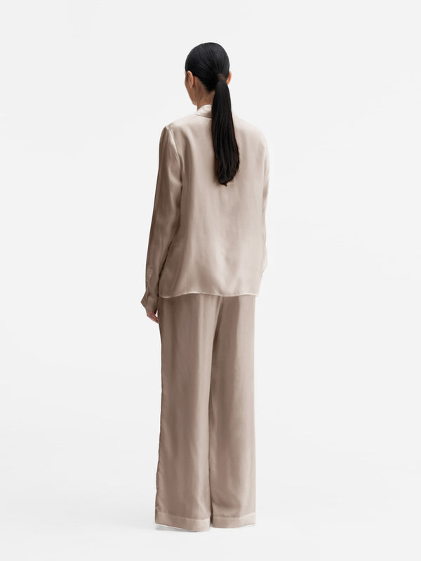 Back view of Ahlvar Gallery Madoka silk twill trousers greige