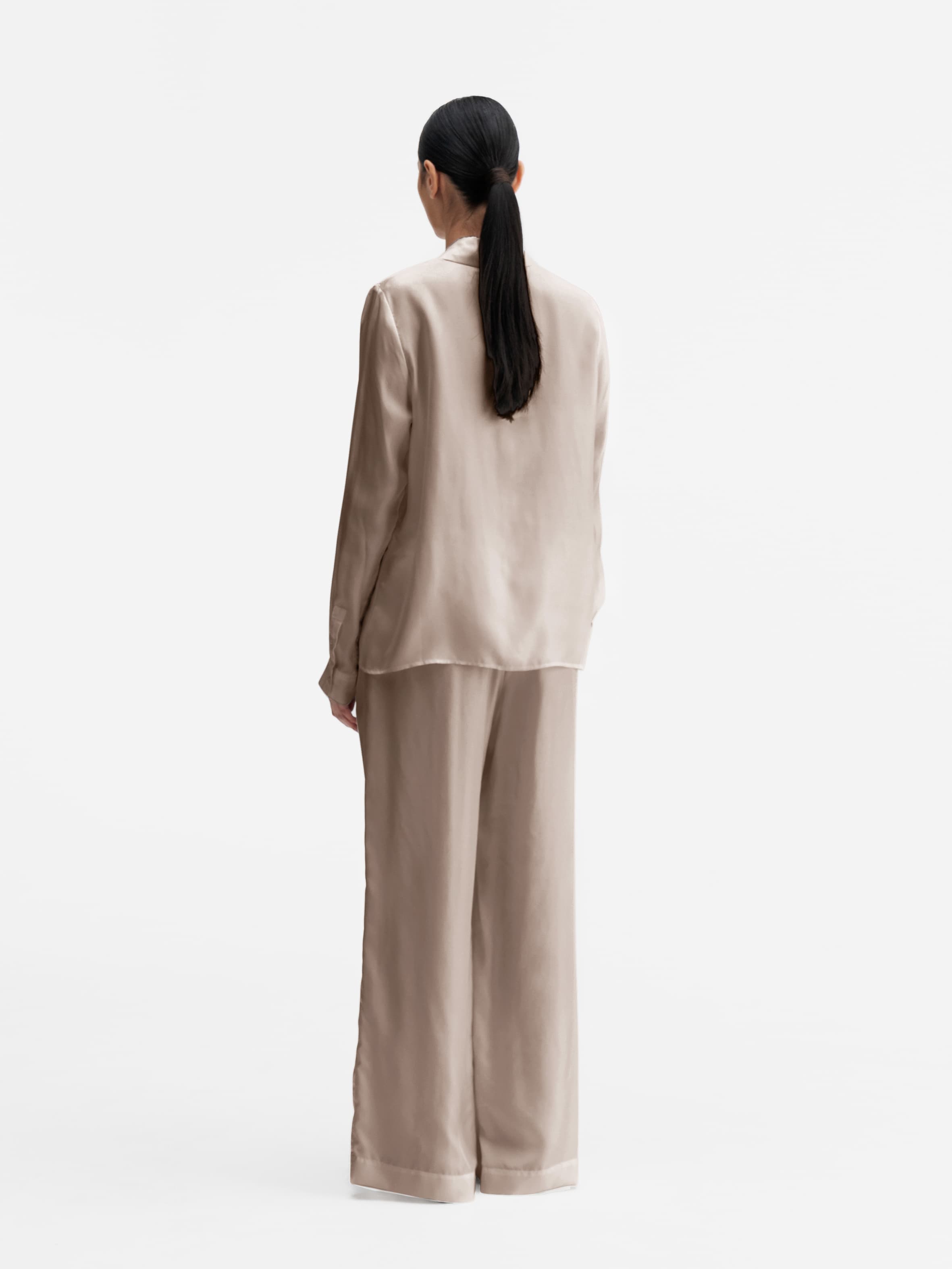 Back view of Ahlvar Gallery Madoka silk twill trousers greige