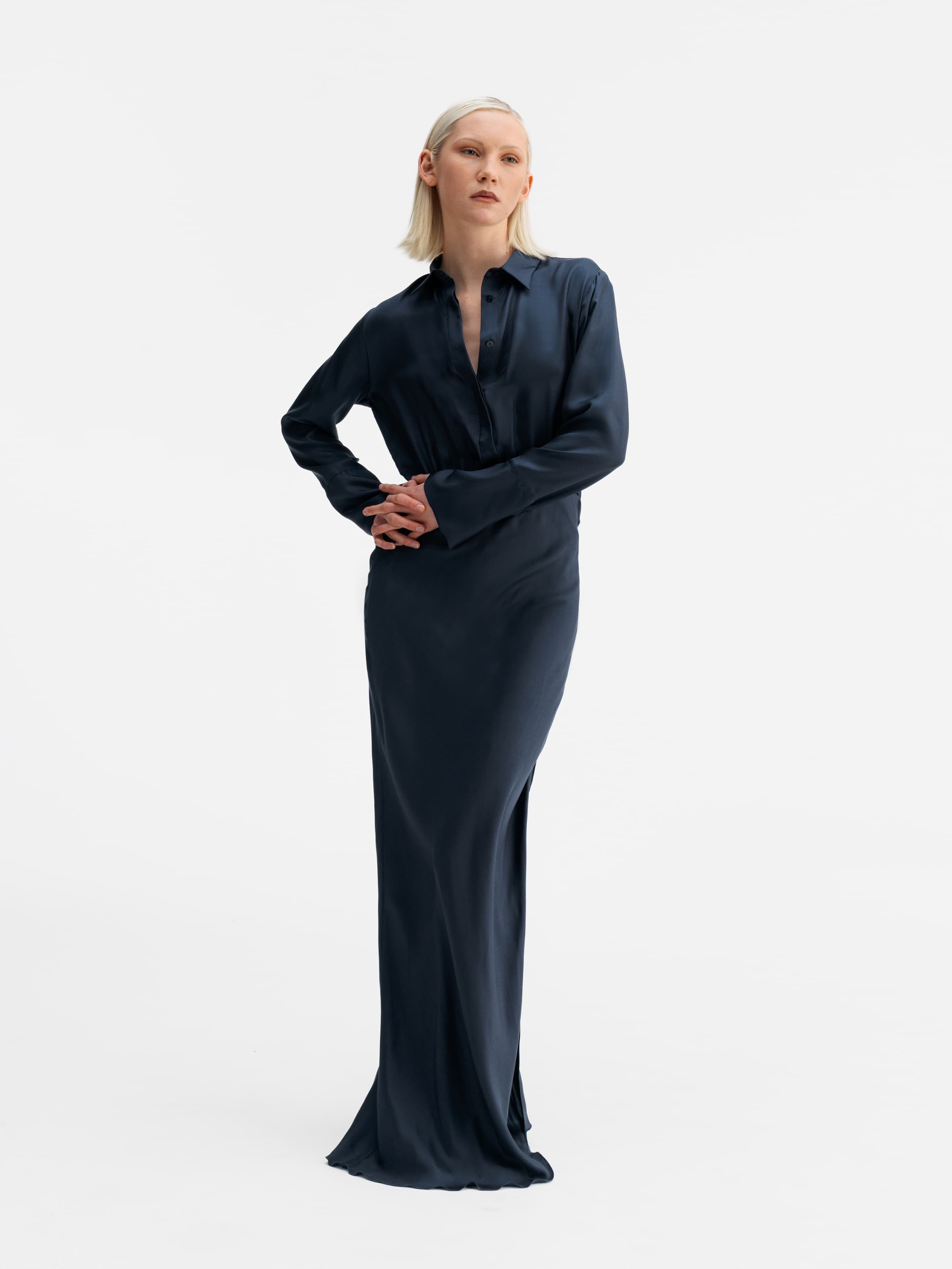 Model wearing Ahlvar Gallery Mia silk twill dress blue grey