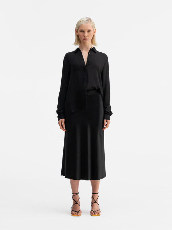 Model wearing Ahlvar Gallery Mia silk shirt black