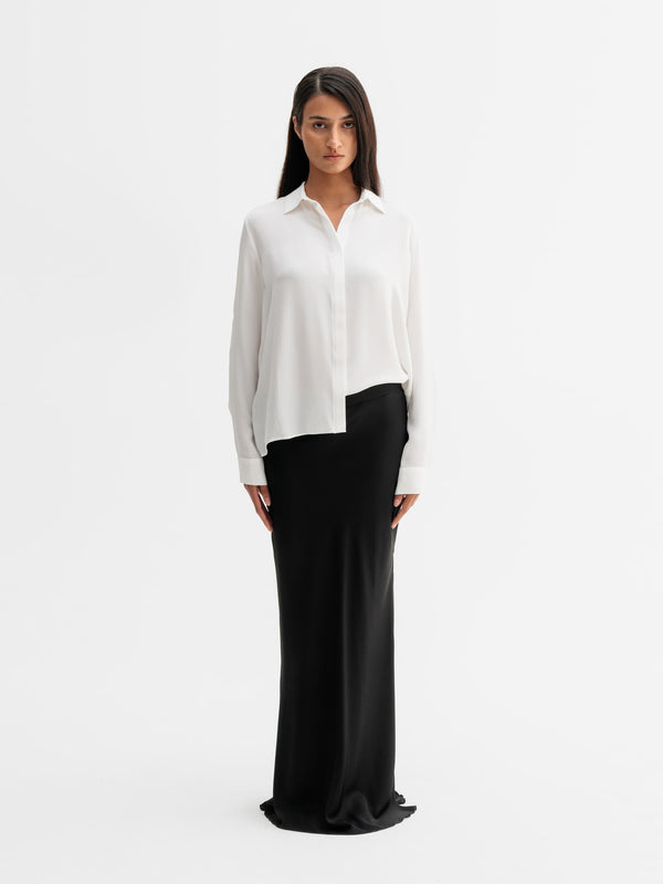 Model wearing Ahlvar Gallery Mia silk shirt in White