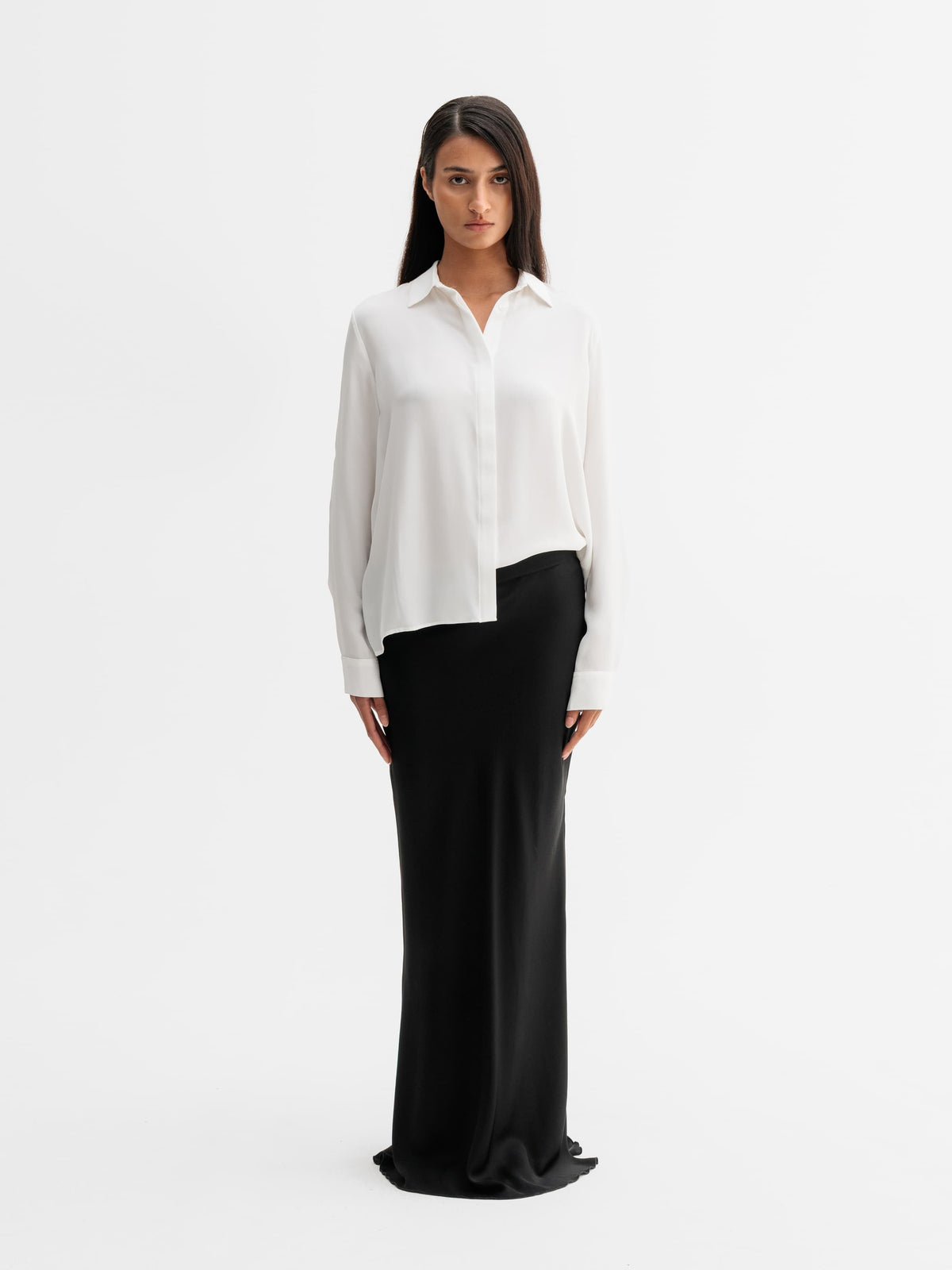 Model wearing Ahlvar Gallery Mia silk shirt in White