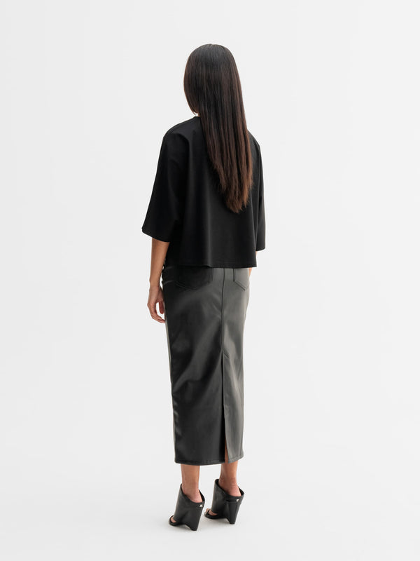Back view of Ahlvar Gallery Mika PU leather skirt in Black