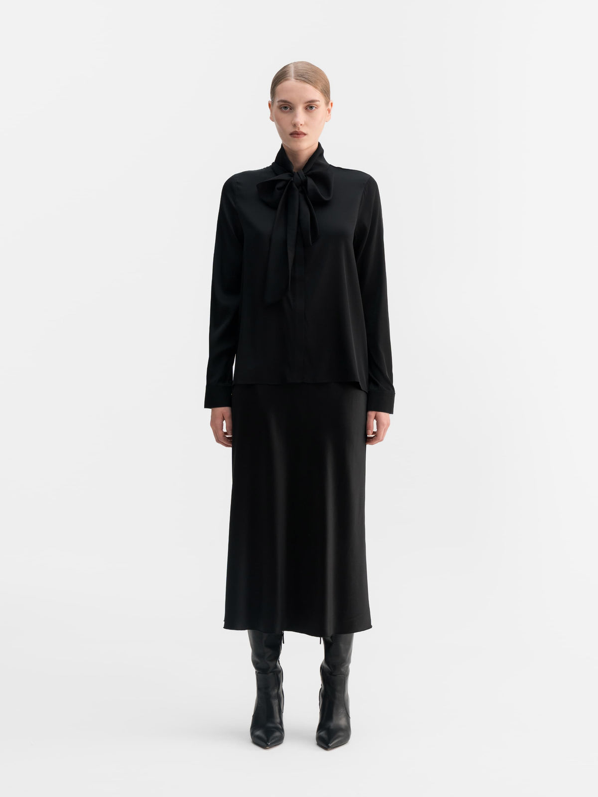 Model wearing Ahlvar Gallery Miki silk blouse in Black