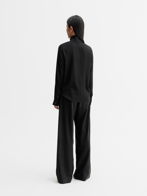 Back view of Ahlvar Gallery Miki silk blouse in Black
