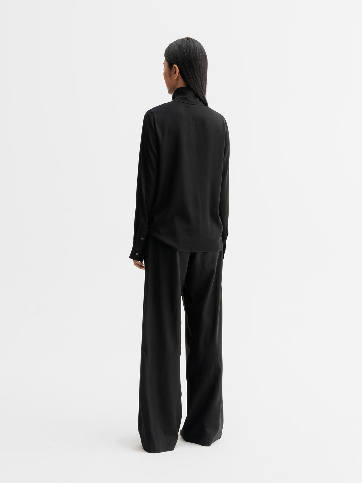 Back view of Ahlvar Gallery Miki silk blouse in Black