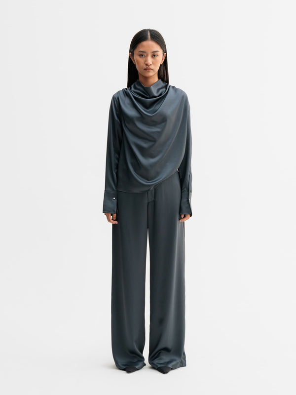 Model wearing Ahlvar Gallery Miko satin blouse in Dark grey