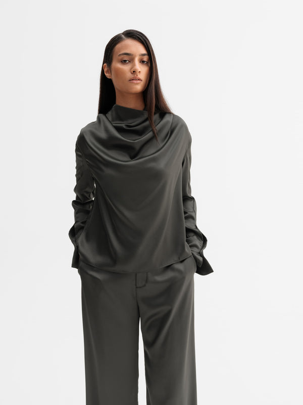 Model wearing Ahlvar Gallery Miko satin blouse in Wood