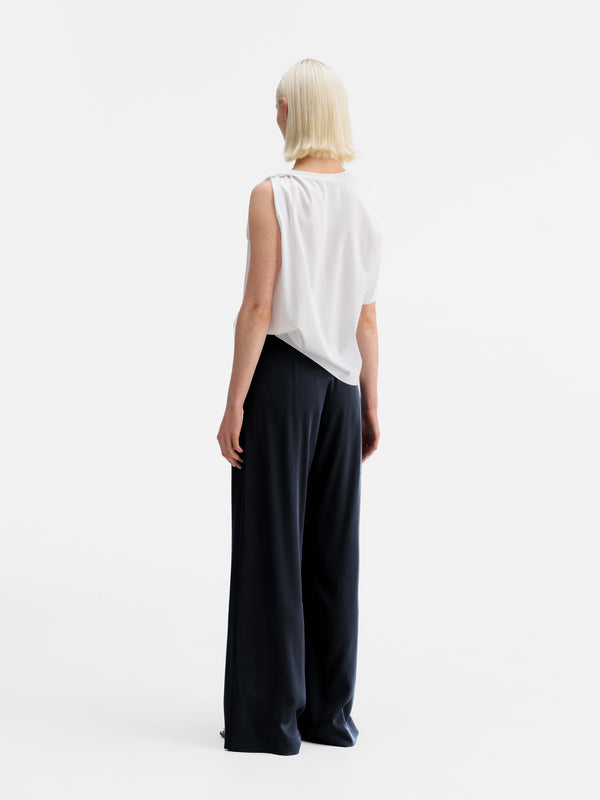 Back view of Ahlvar Gallery Mila heavy satin trousers blue grey