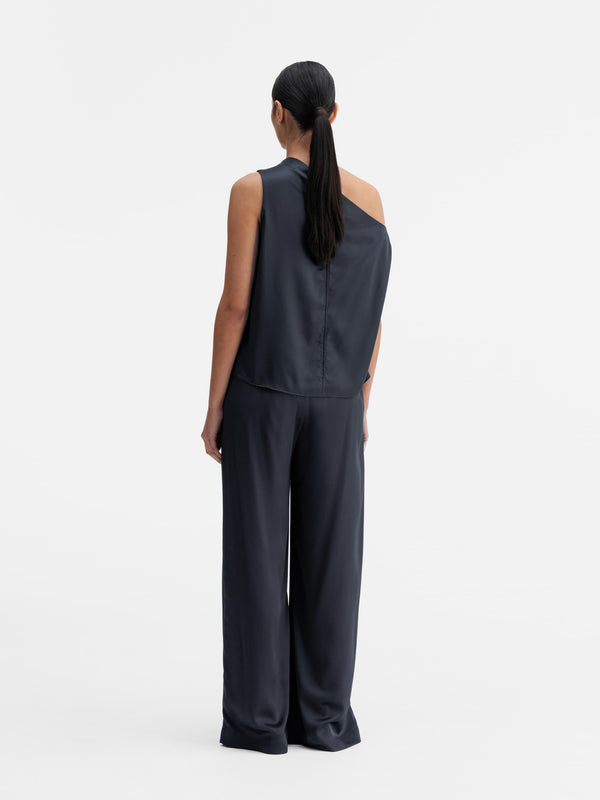 Back view of Ahlvar Gallery Mila satin trousers blue grey