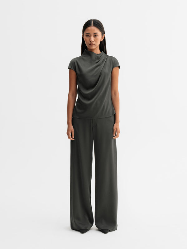 Model wearing Ahlvar Gallery Mila trousers in Wood