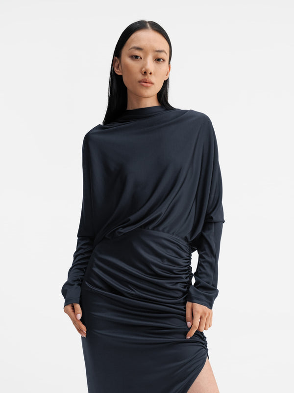 Model wearing Ahlvar Gallery Milly jersey blouse blue grey