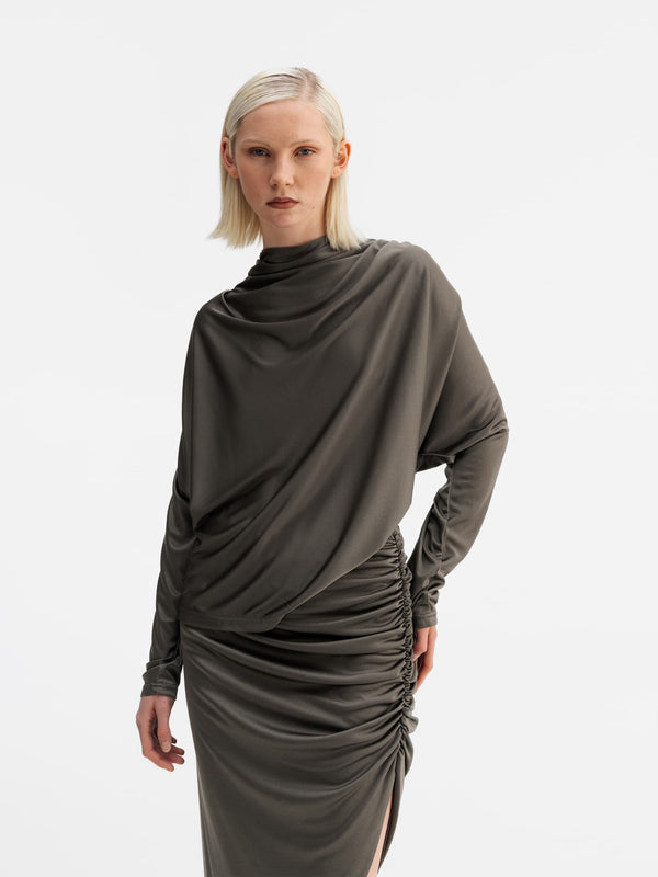 Model wearing Ahlvar Gallery Milly jersey blouse light military