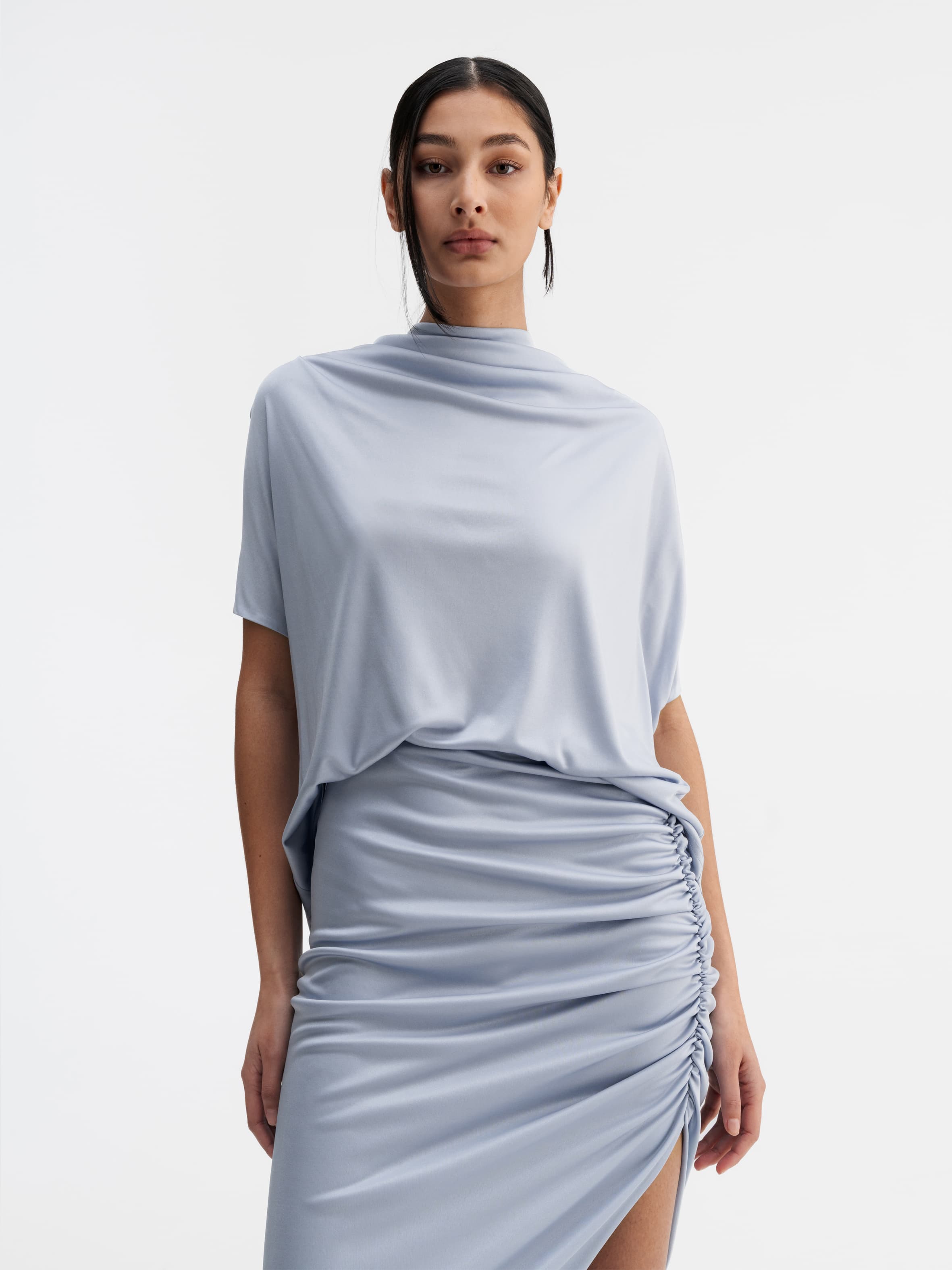 Model wearing Ahlvar Gallery Milly jersey top denim blue